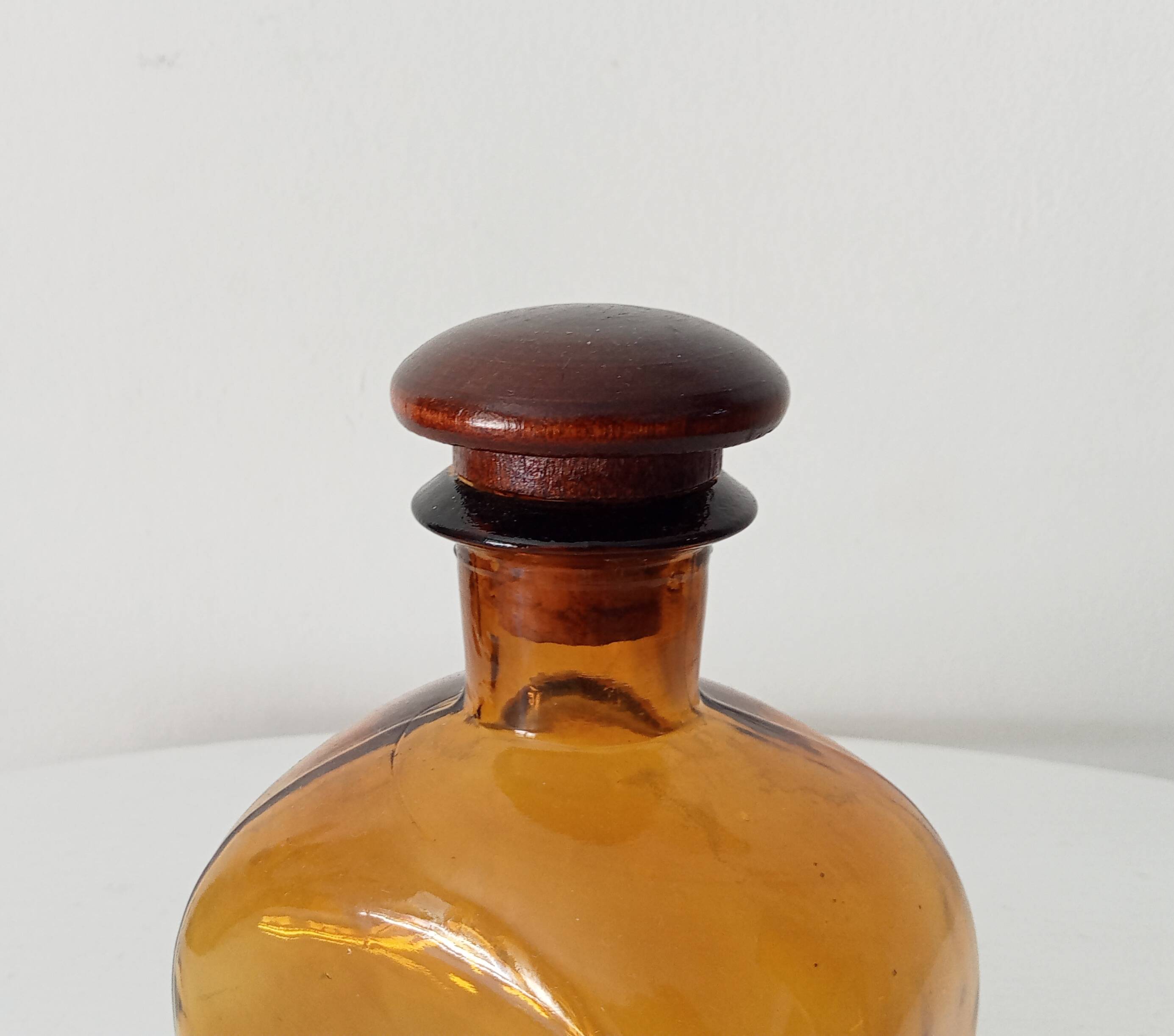 Vintage amber glass apothecary bottle