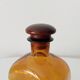 Vintage amber glass apothecary bottle