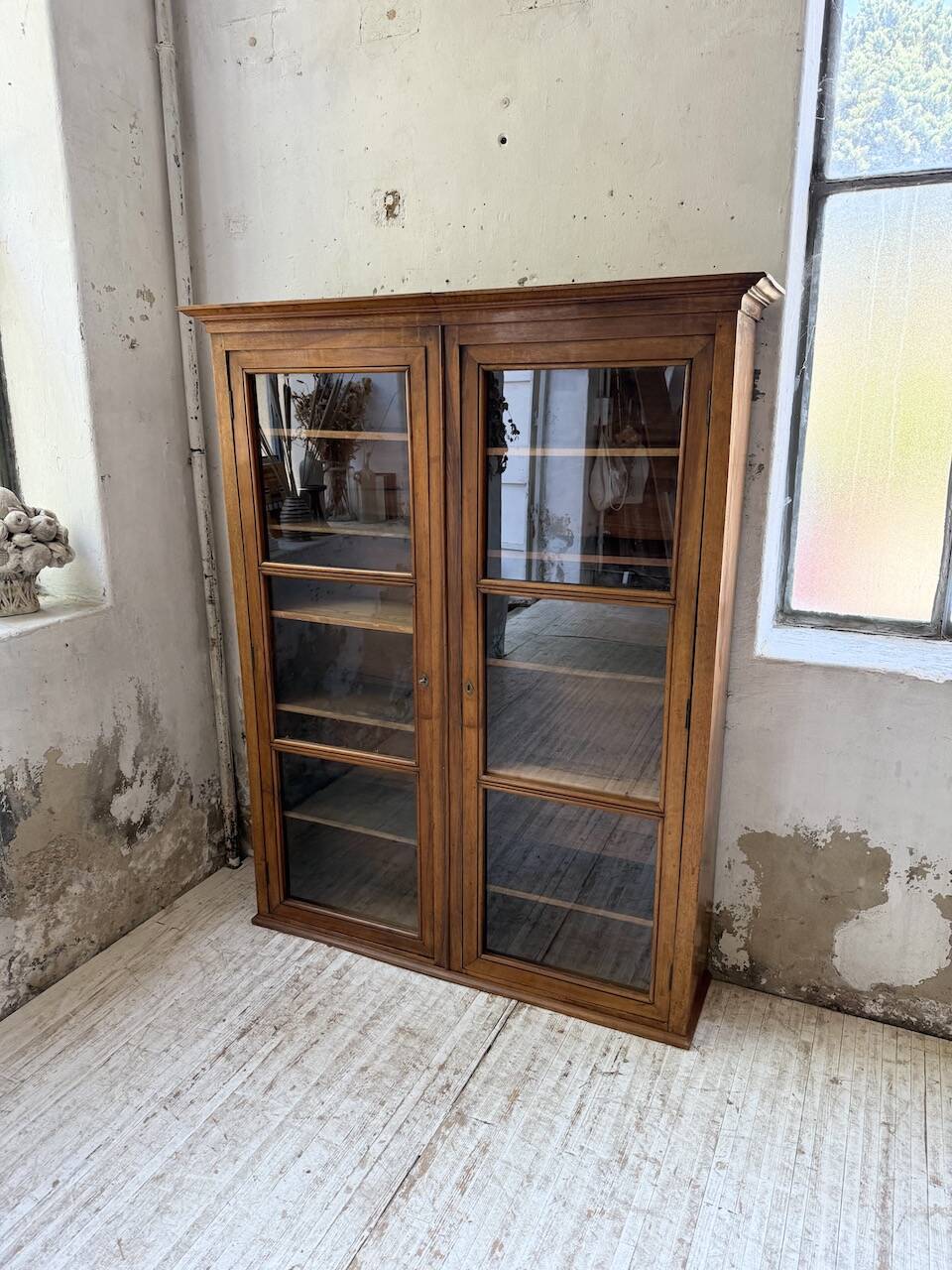 Glass-fronted walnut library 1900