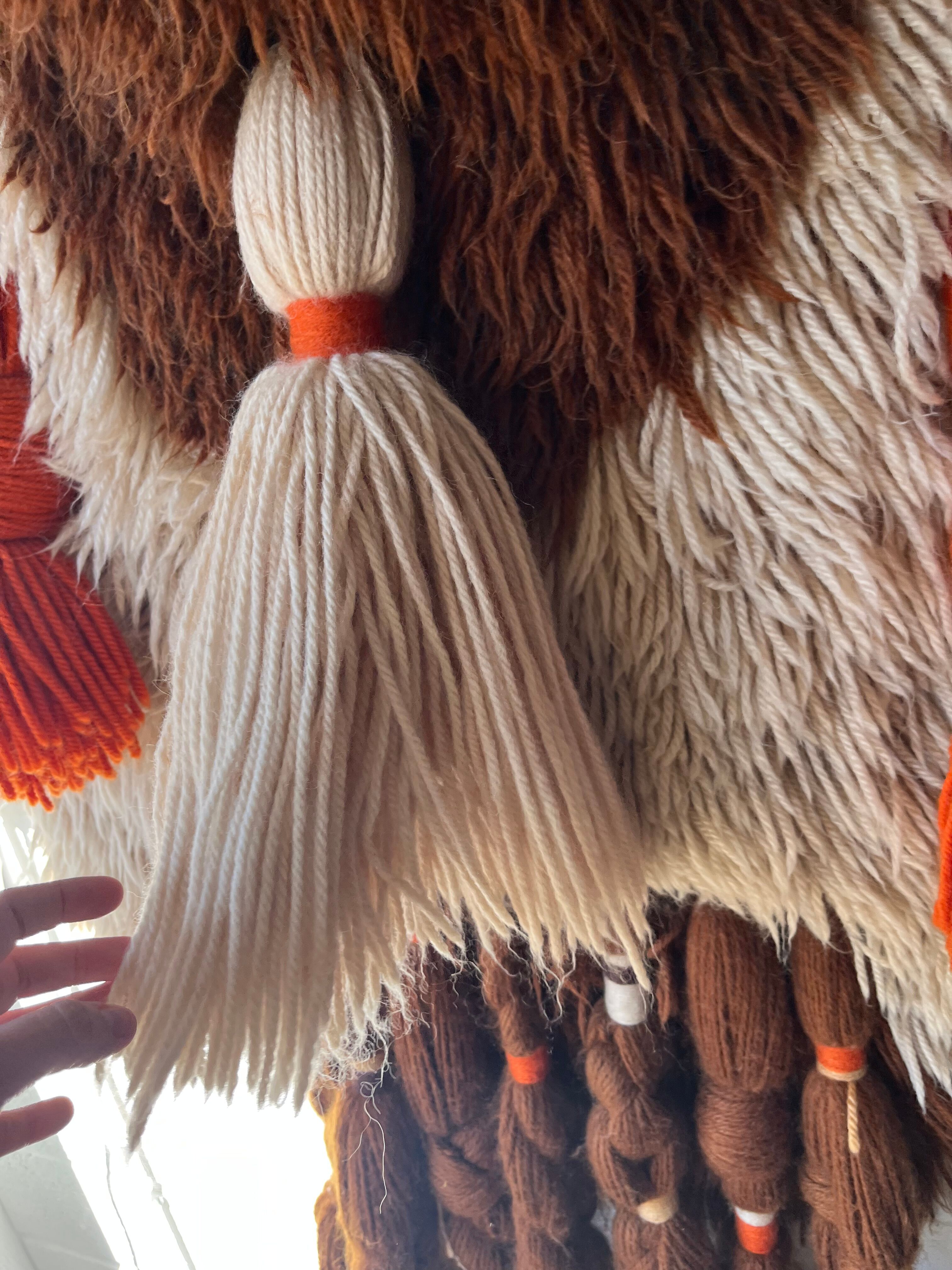 Handmade woven wool wall tapestry from the 70s and 80s, vintage macramé.