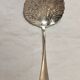 Scallop spoon, silver metal