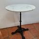 Bistro pedestal table in cast iron and marble