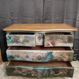 Patinated crossbow chest of drawers