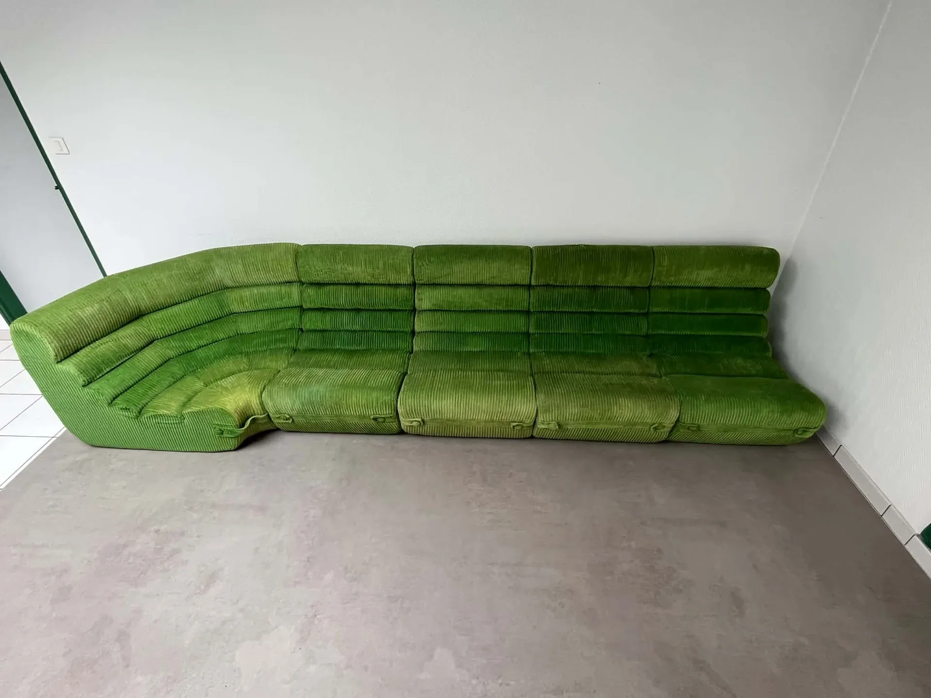 Modular green velvet corner sofa, 1970s