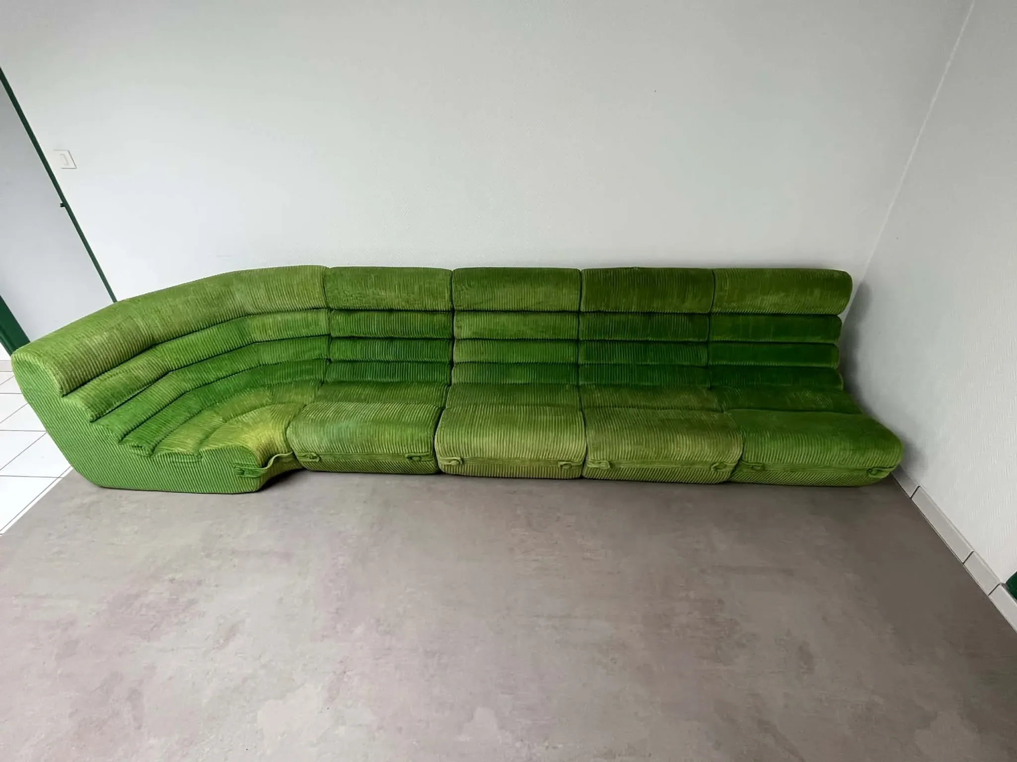 Modular green velvet corner sofa, 1970s