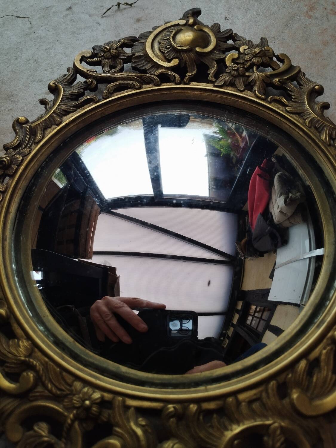 Pair of antique witch mirrors, curved glass, bronze frame