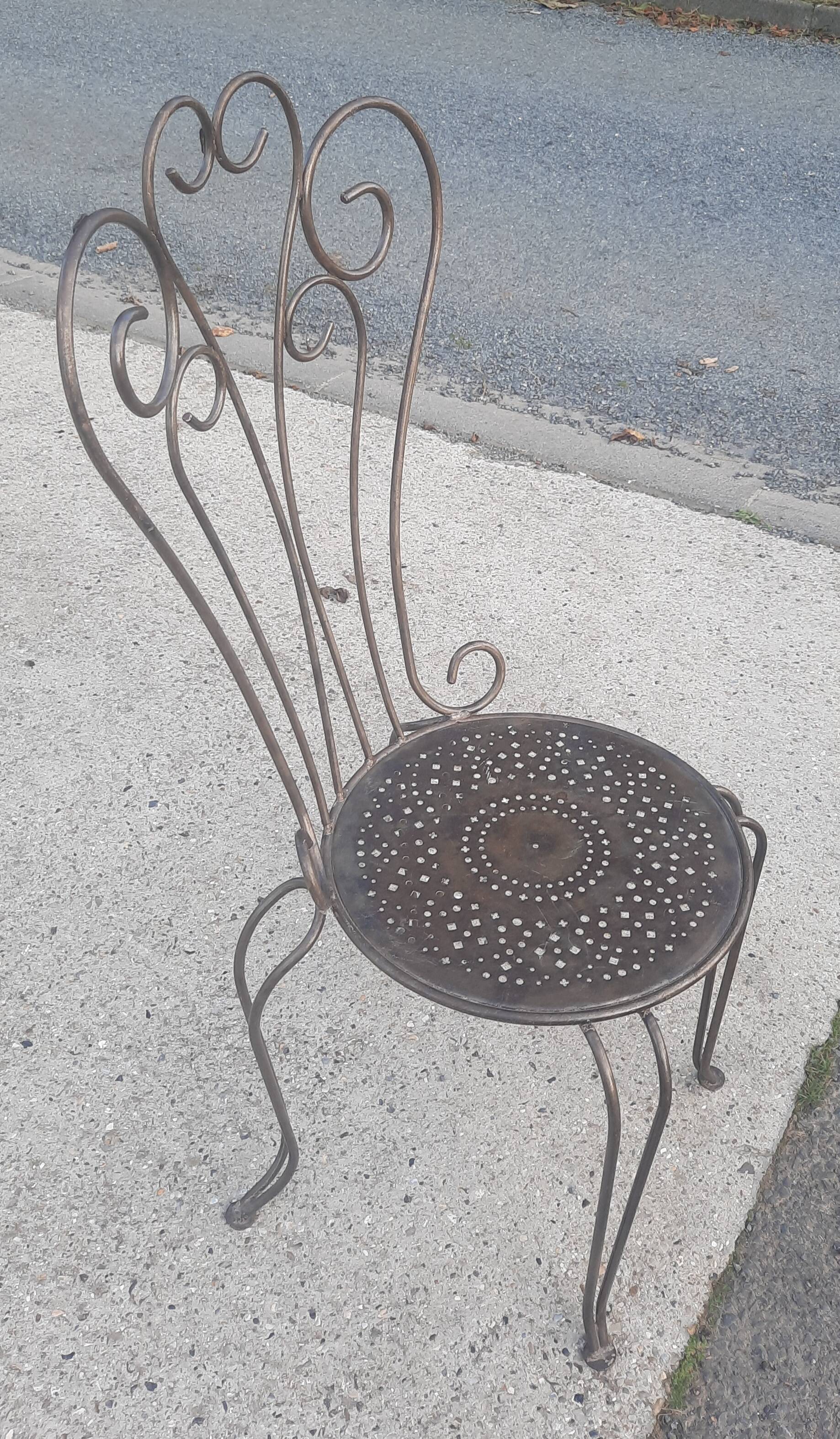 Bent metal chair