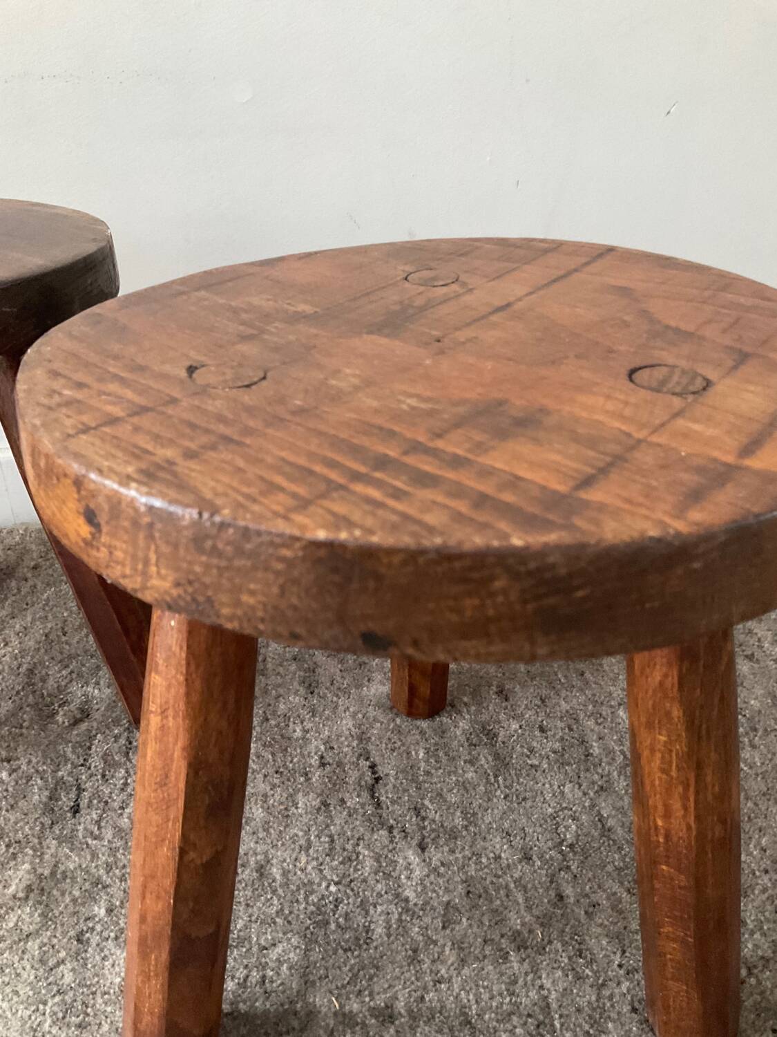 Pair of wooden tripod foot stools