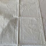 Pair of hand-embroidered SR monogram pillowcases.