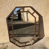 Mirror with parecloses