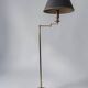 Brass reading floor lamp, adjustable arm, vintage anthracite shade.