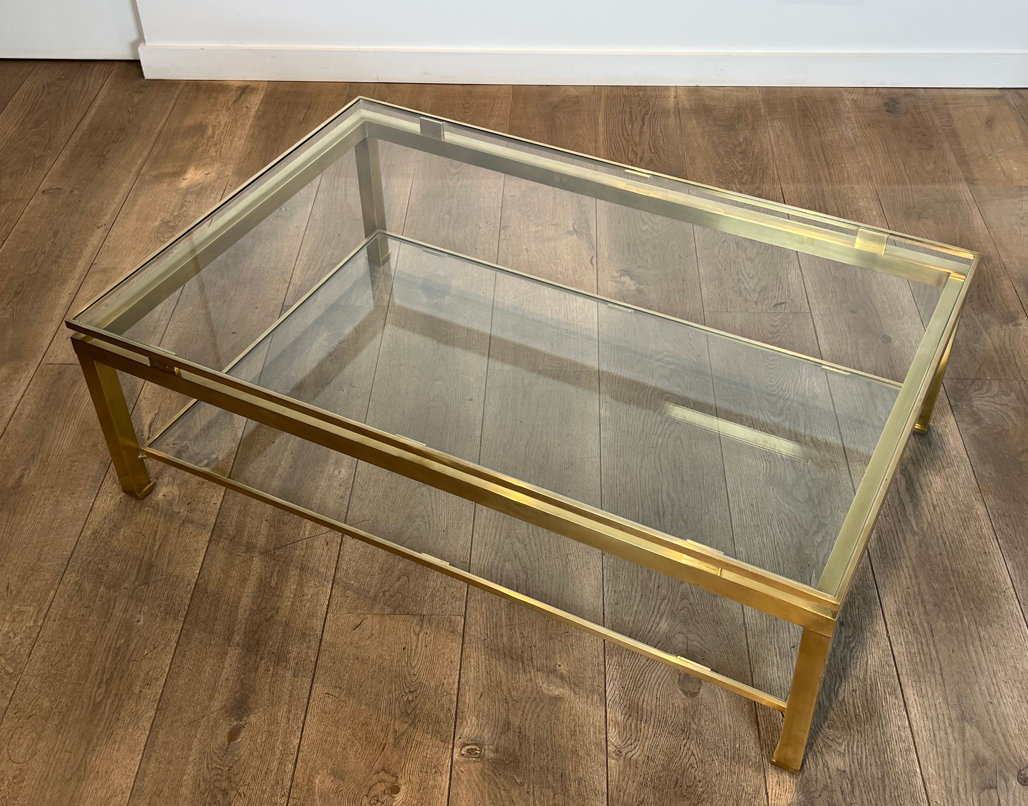Modernist coffee table in brass and glass tops by Guy Lefèvre for Maison Jansen.