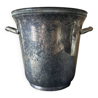 Old champagne bucket in silver metal