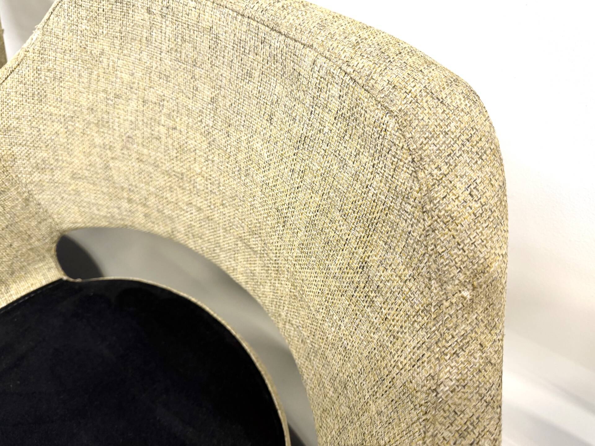 Series of six swivel chairs with an organic shell, patterned fabric and base.