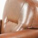 Armchair made of sheepskin leather with refined decorative nail finish