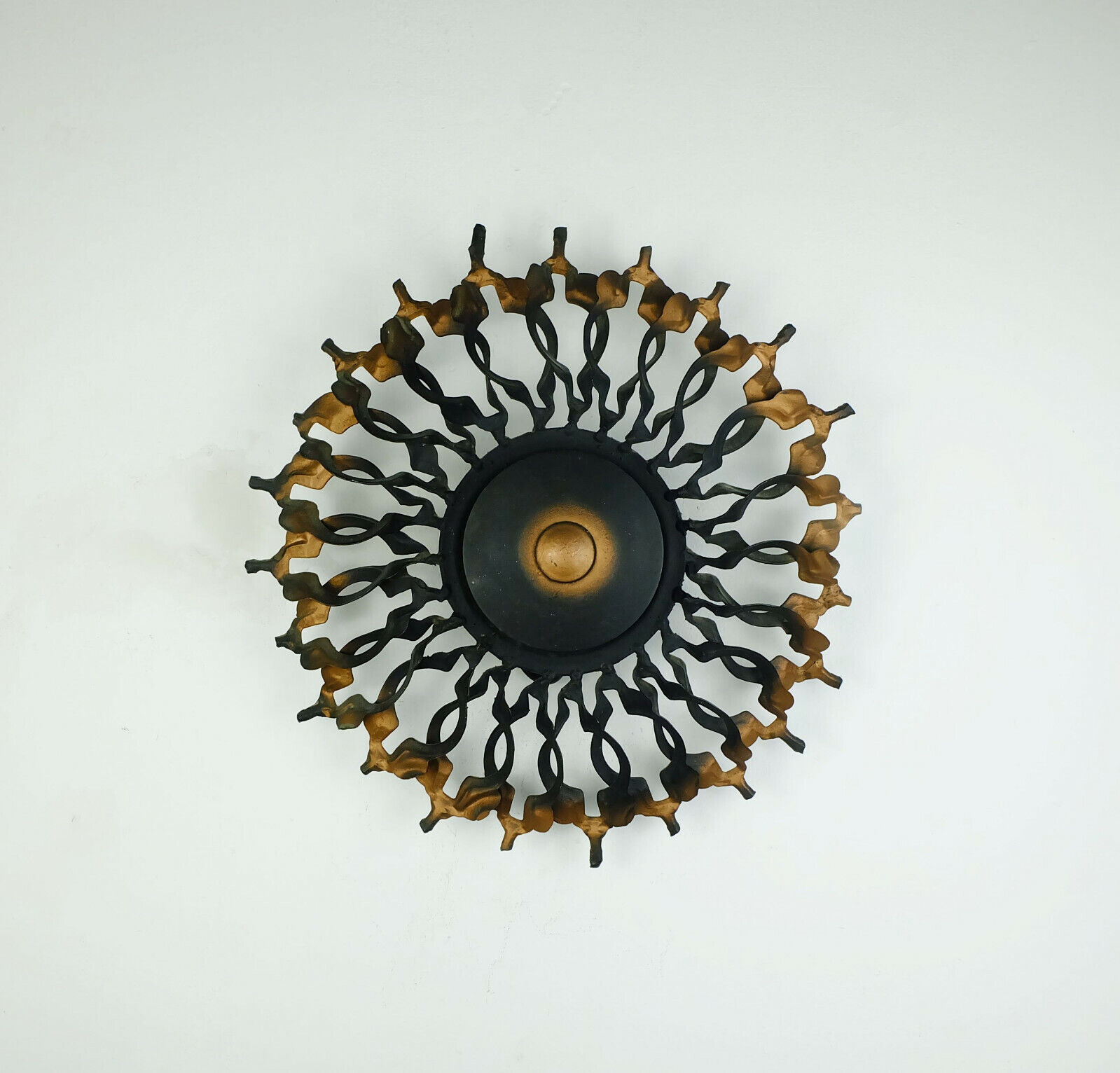 1960s SCONCE mid century sunburst brutalist black iron and copper colored