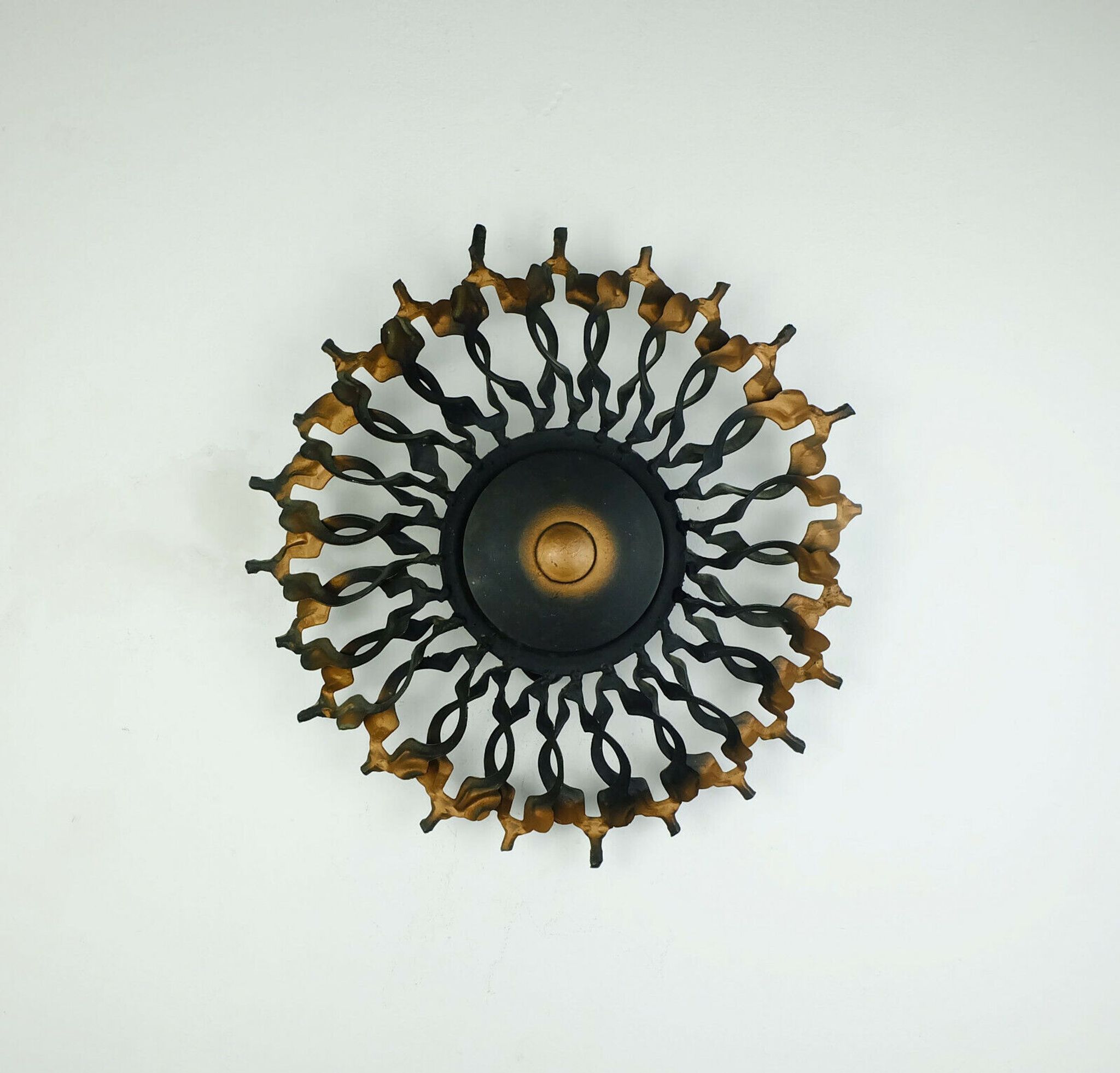 1960s SCONCE mid century sunburst brutalist black iron and copper colored
