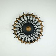 1960s SCONCE mid century sunburst brutalist black iron and copper colored