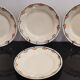 Old semi-deep plates in Terre de fer earthenware