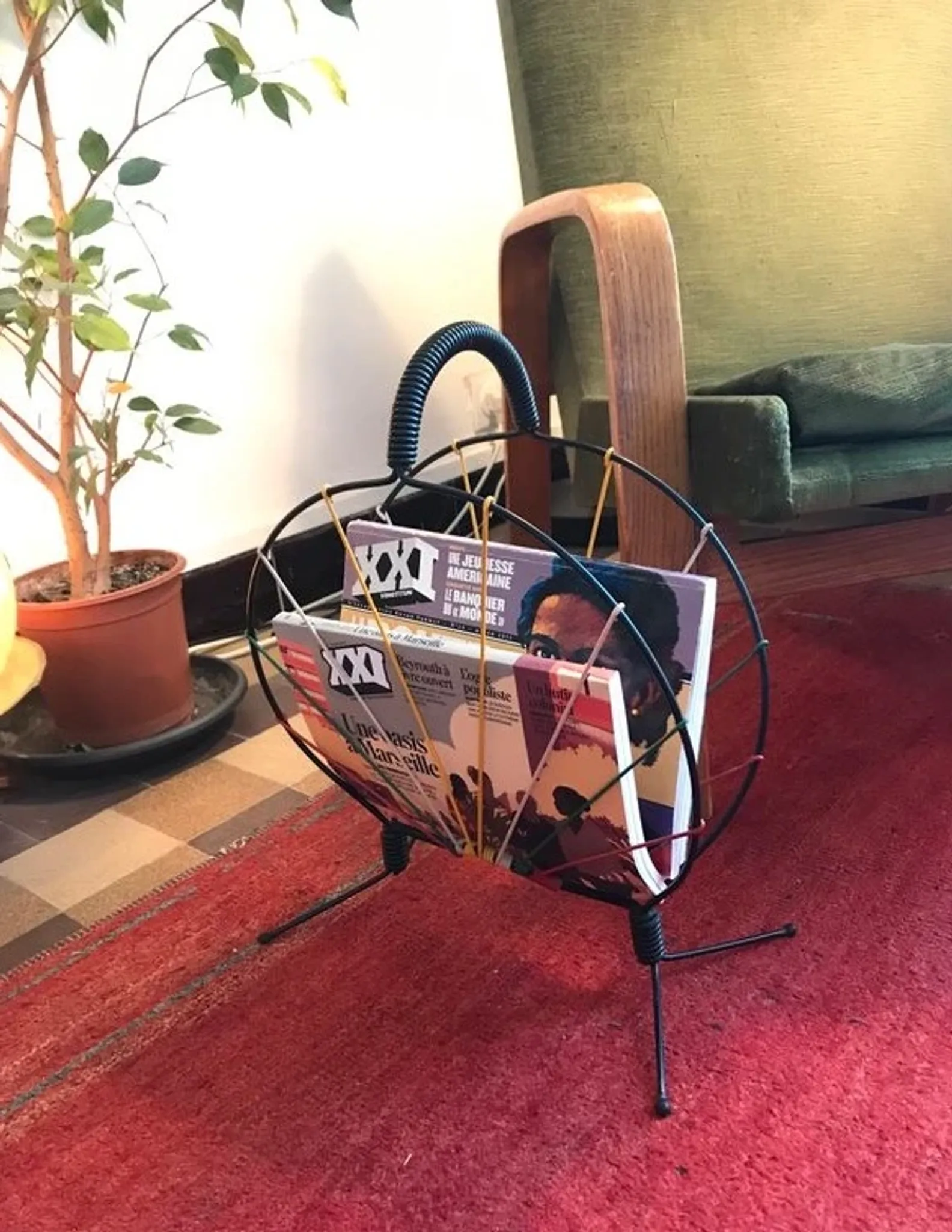 Vintage wire magazine rack from the 1950s.