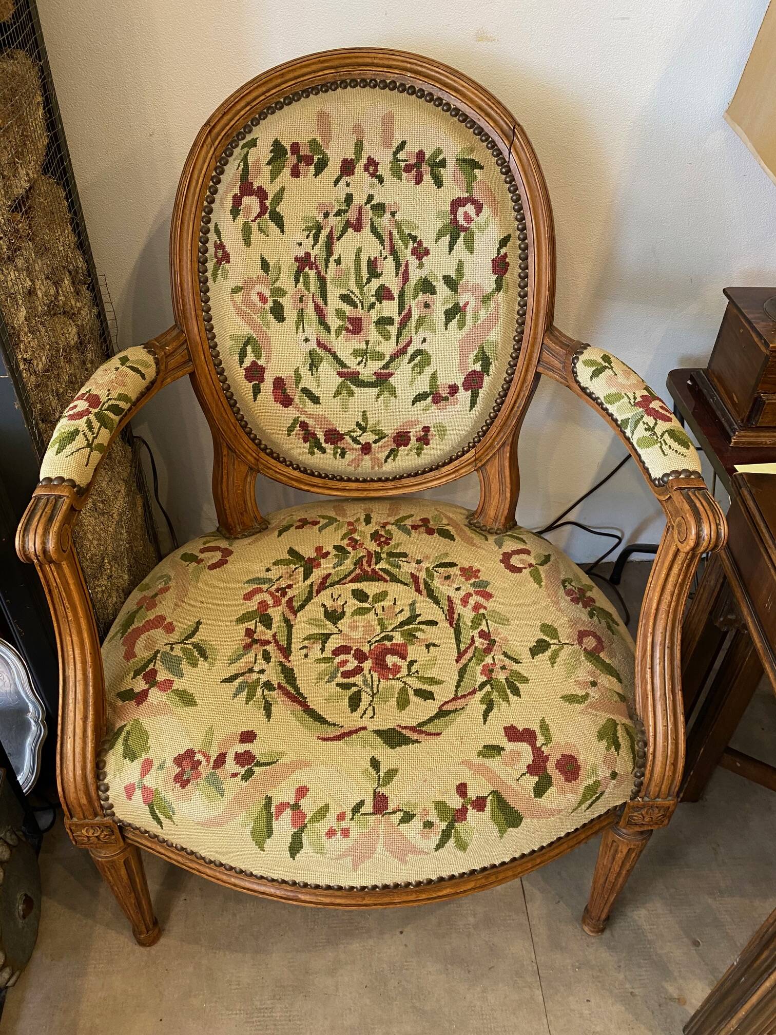 Louis XVI style medallion armchair with floral needlepoint tapestry