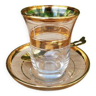 Turkish tea glass, saucer and golden spoon