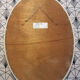 Vintage white oval mirror in resin.