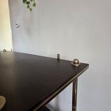 Wooden shelf with gold metal