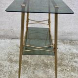 Vintage 1970s glass and gold rolling console table.