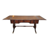 English desk in solid mahogany with lion paws. Leather top