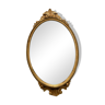 Oval golden mirror