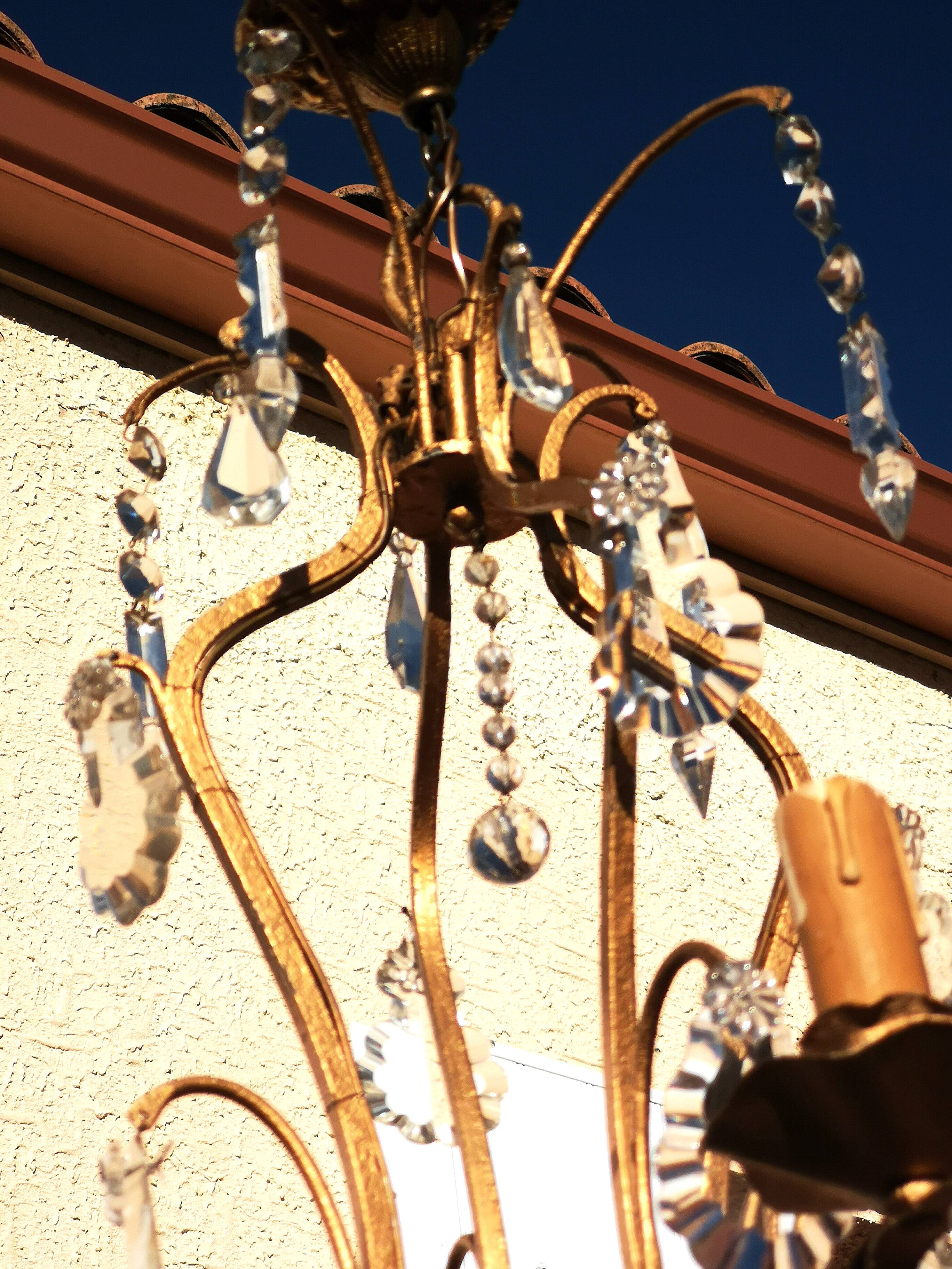 Wrought iron chandelier with pendants