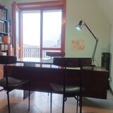 Desk and 3 chairs in 1950s Italian modernist style in rosewood.
