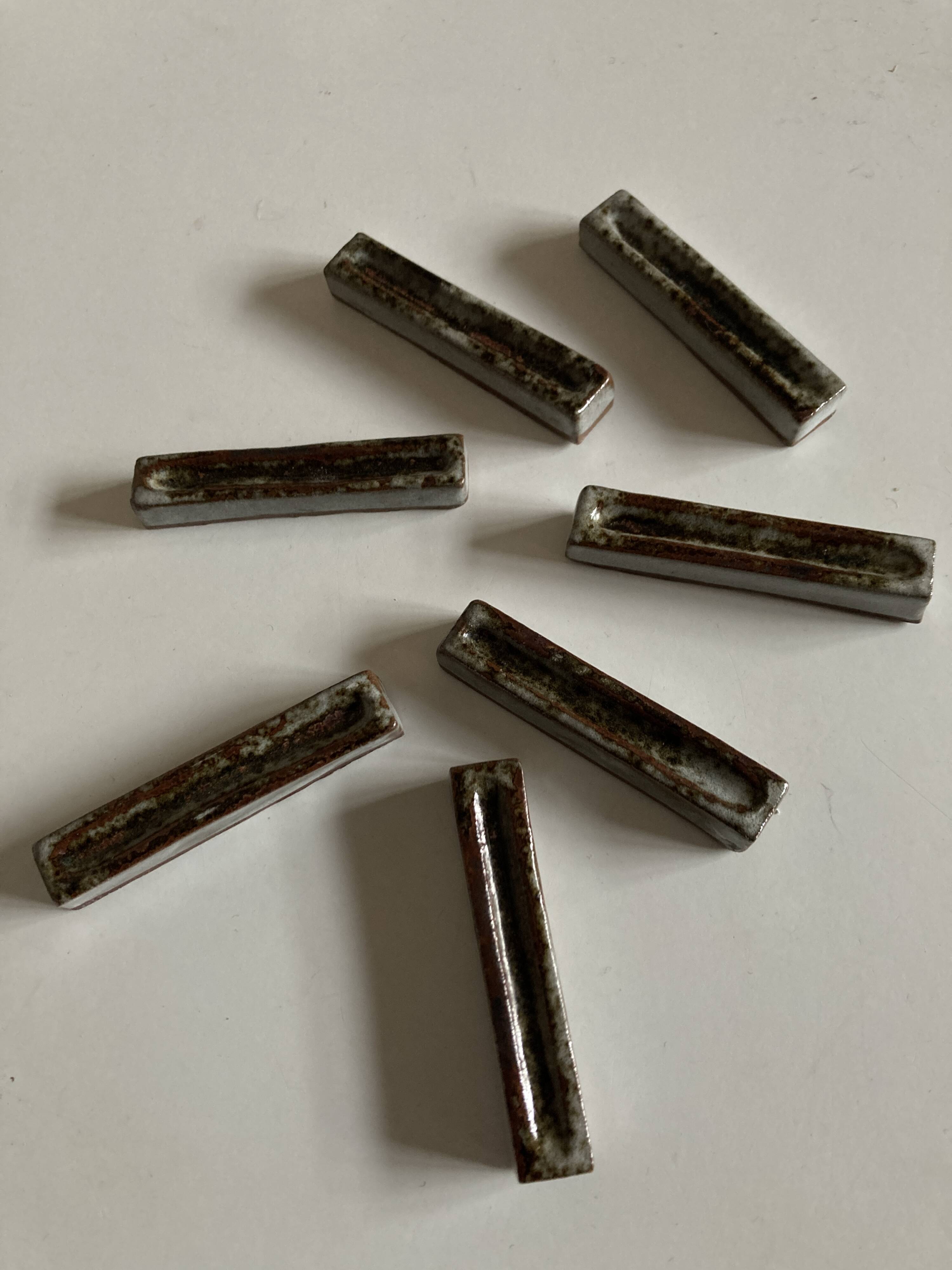 Set of 7 modernist pyrite stoneware potter's knife holders 1970