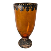 Vintage amber glass vase on a pedestal