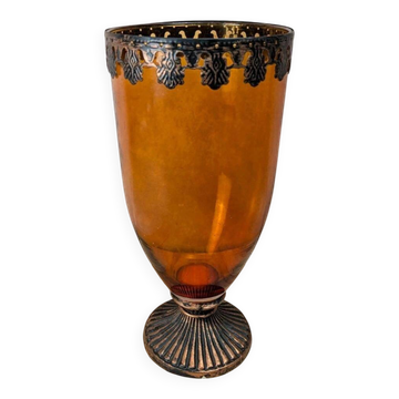 Vintage amber glass vase on a pedestal