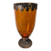 Vintage amber glass vase on a pedestal