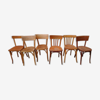 Set of six mismatched bistro chairs