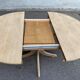 Renovated Scandinavian dining table in solid oak with a central leg from the 1970s.