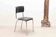 Vintage Tubax chair in black and chrome leatherette