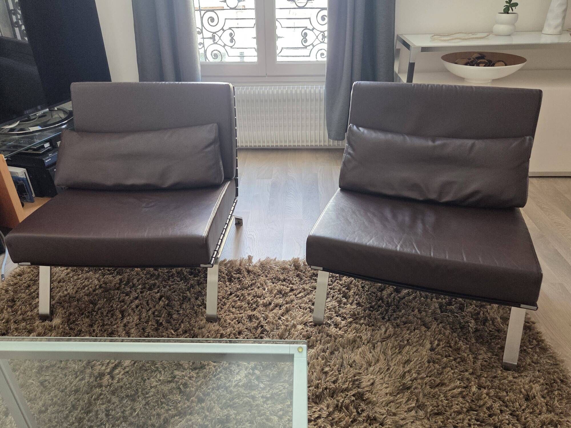 2 ligne roset flexus armchairs – full-grain leather
