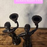 Statuette candle holder