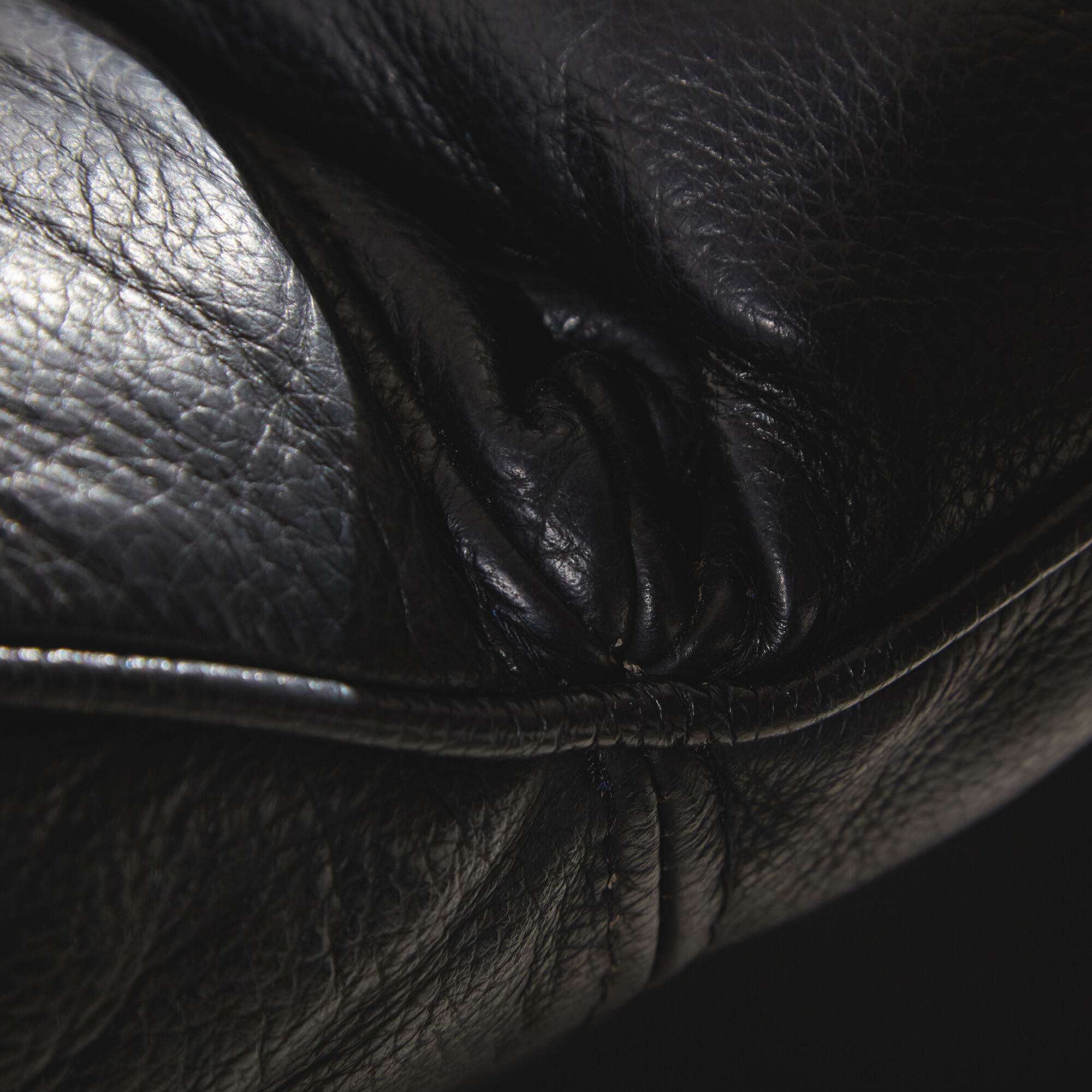 Two-seater leather sofa