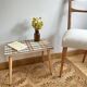 Small mosaic bedside table with tapered legs.