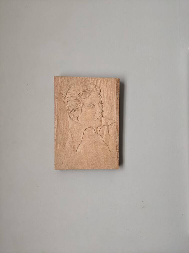 Handcrafted wall sculpture portrait of a woman from the 60s, handcrafted frame