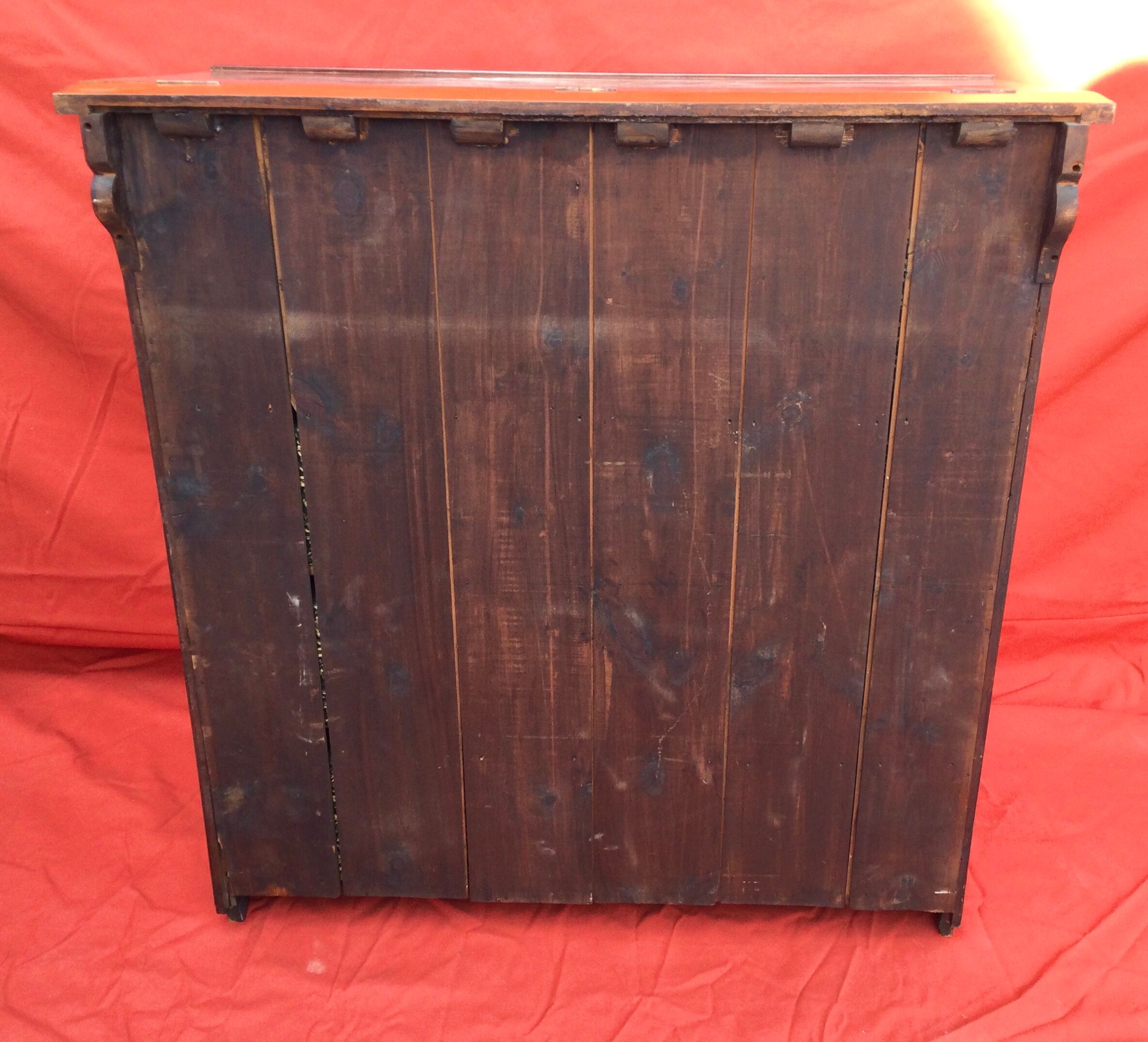 Cardboard maker forming mahogany writing