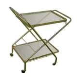 Dessert with gold metal roulette and foldable smoked glass