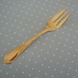 Golden metal cake forks