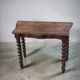 Console in carved solid oak with twisted turned legs, 1890