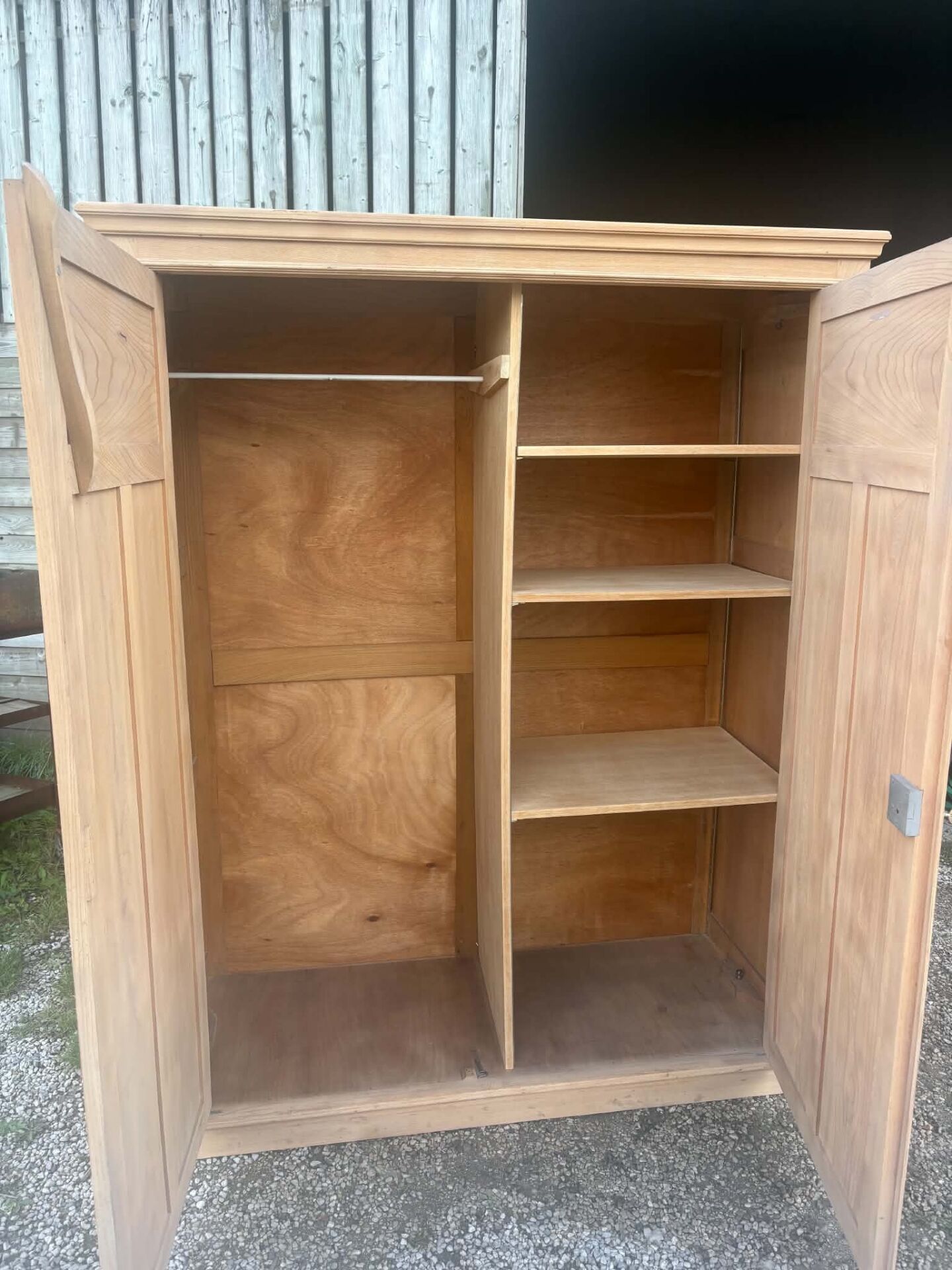 Large antique wardrobe in raw wood